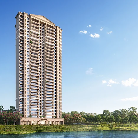 Lodha Azur, Bannerghatta Road - a different project Residential tower beside a lake under a blue sky, Lodha Azur render